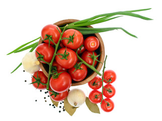 The branch of cherry tomatoes in a wooden bowl, isolated on whit - Powered by Adobe