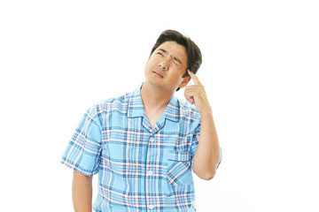 頭痛を訴える男性