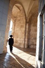 Man Walking Through Jaffa Gate - Jerusalem, Israel - 64735658
