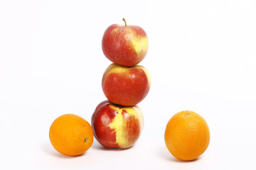 Fresh orange and apple isolated on white background