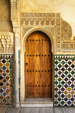 A door decorated in arabic style in La Alhambra, Granada, Spain