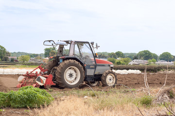 Obraz premium Tractor with tiller