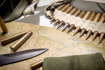 map of Normandy placed on the hood of military vehicle
