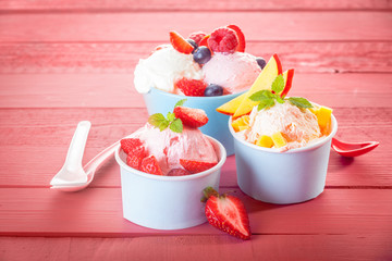 Delicious fruit and berries with frozen yoghurt