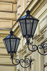 Fototapeta na wymiar Typical lanterns on 19th century neoclassic building in Vienna