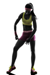 Fototapeta na wymiar woman adjusting sportswear silhouette