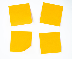 Yellow memo stick isolated on white background