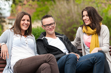 Group of friends having a good time in the park