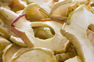 Dried apple rings with skin. Close up.