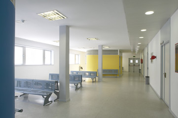 Modern building waiting area with metallic chairs
