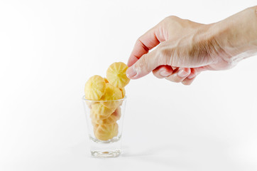 Colorful candy is picked by hand.