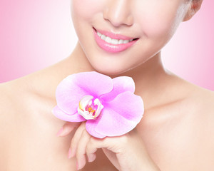 beautiful face with pink orchids