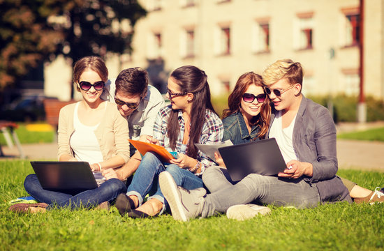 Students Or Teenagers With Laptop Computers