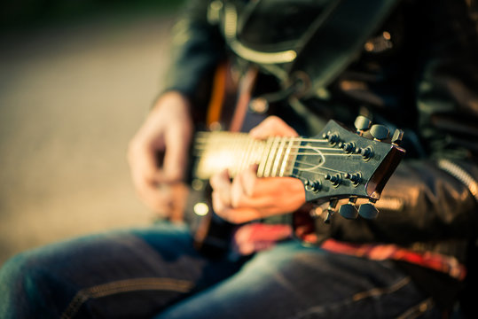 guitar in player hands