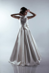 Fototapeta premium Beautiful Bride in elegant wedding dress. Fashion lady.