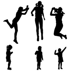 Fototapeta premium Vector silhouette of a woman with a child.