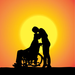 Obraz premium Vector silhouettes of people in a wheelchair.