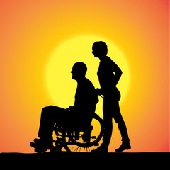 Vector silhouettes of people in a wheelchair.