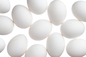 Many white eggs isolated on white background