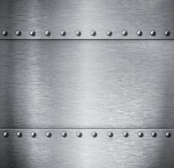 brushed metal background with rivets