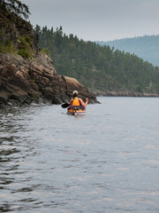 Woman kayaking in a river, Quebec, Canada