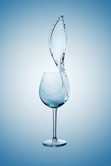 Water Splash in Wine Glass.