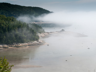 Fog over river, Quebec, Canada