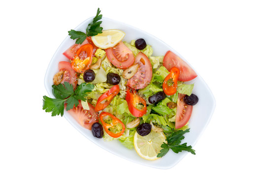 Above view of fresh Mediterranean salad with Pure olive oil