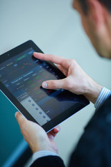 men holding digital tablet