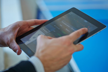 men holding digital tablet
