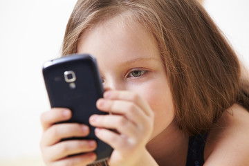 little girl with mobile phone