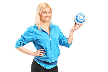 Female handball player holding a ball