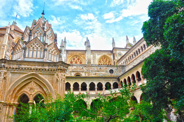 Monasterio de Guadalupe, España, claustro, arte mudéjar - obrazy, fototapety, plakaty