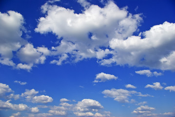 The white clouds against the pure blue sky