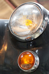 Close-up of headlight of a car