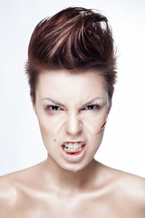 beautiful girl with a cut on face