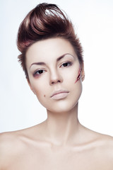 beautiful girl with a cut on face
