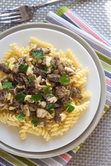 Spiral pasta with morel mushrooms