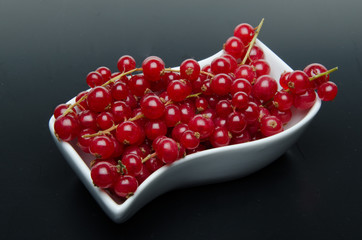 Redcurrants in a small dish