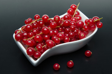 Redcurrants in a small dish