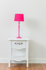 Lamp on bedside table