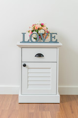 Love sign on bedside table