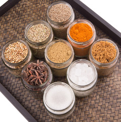 Sugar and spices in a wicker tray