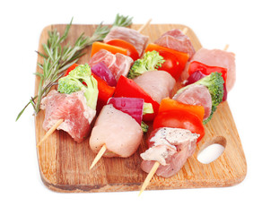 Raw pork kebab isolated on white