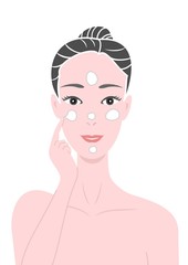 顔にクリームをつける女性