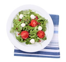 Green salad made with  arugula, tomatoes, cheese mozzarella