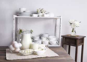 Still life with tasty dairy products on table