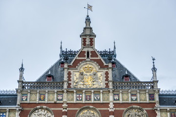 Naklejka premium Amsterdam central railway station in Netherlands.