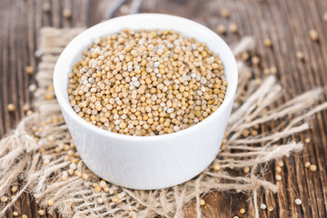 Mustard Seeds (on wooden background)