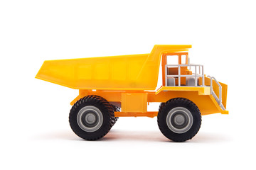 Obraz na płótnie Canvas Ciężarówka zabawka Dump samodzielnie na białym tle